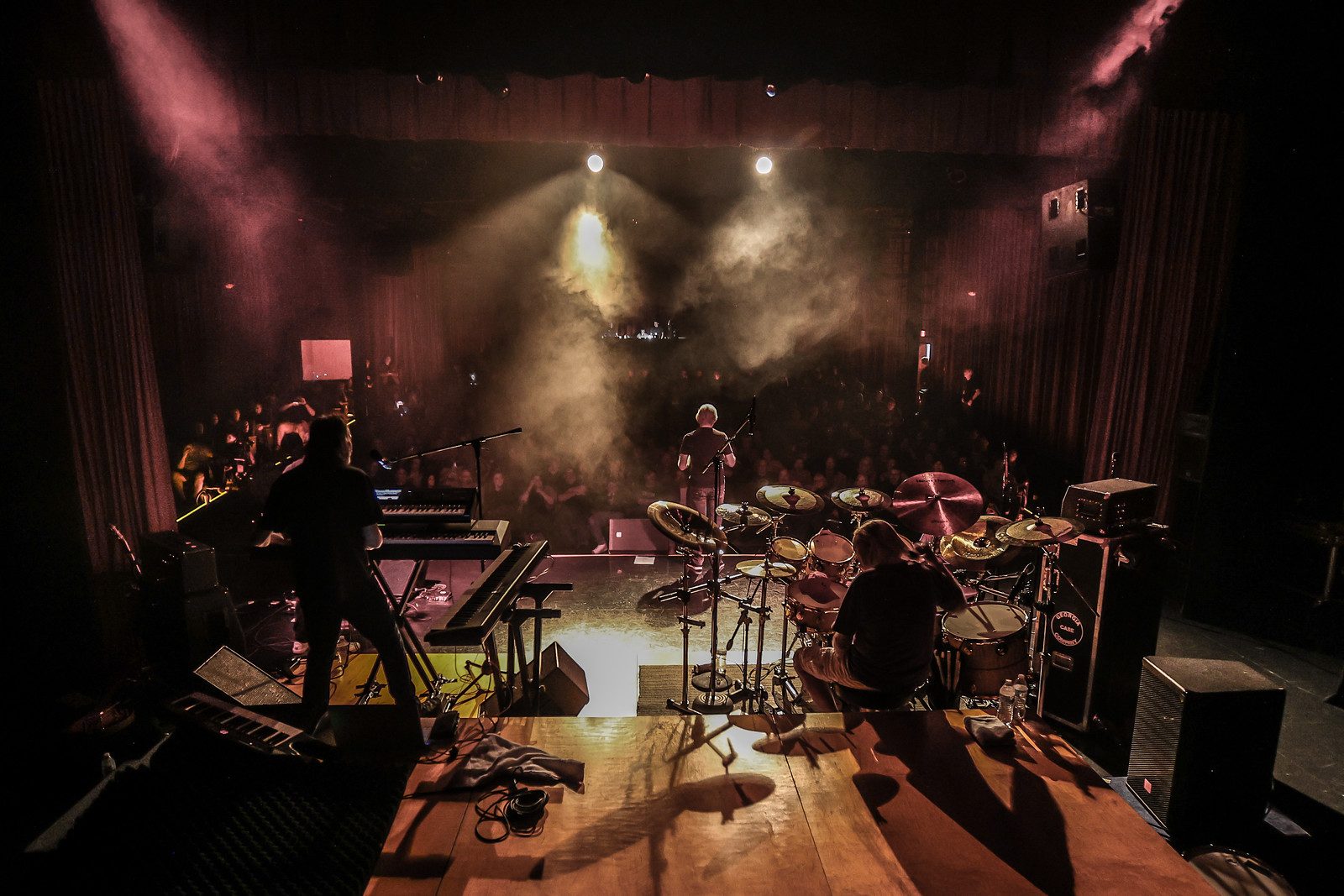 Overhead view of the Branson Meadows stage bathed in concert lighting and haze